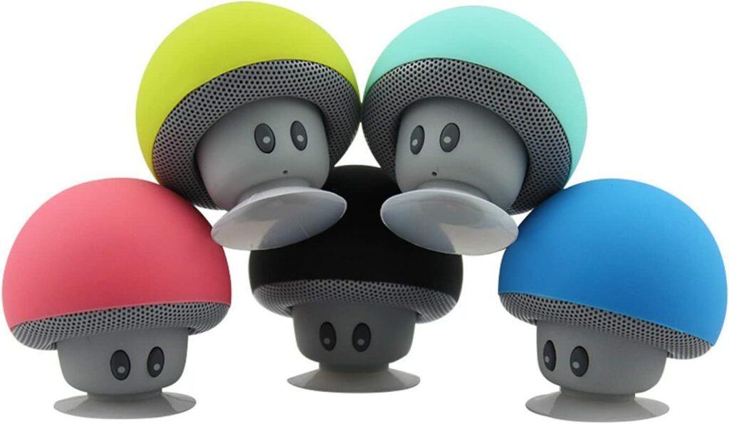 Bluetooth Boxen mit Saugnapf und Gesicht mit bunten Haarfarben